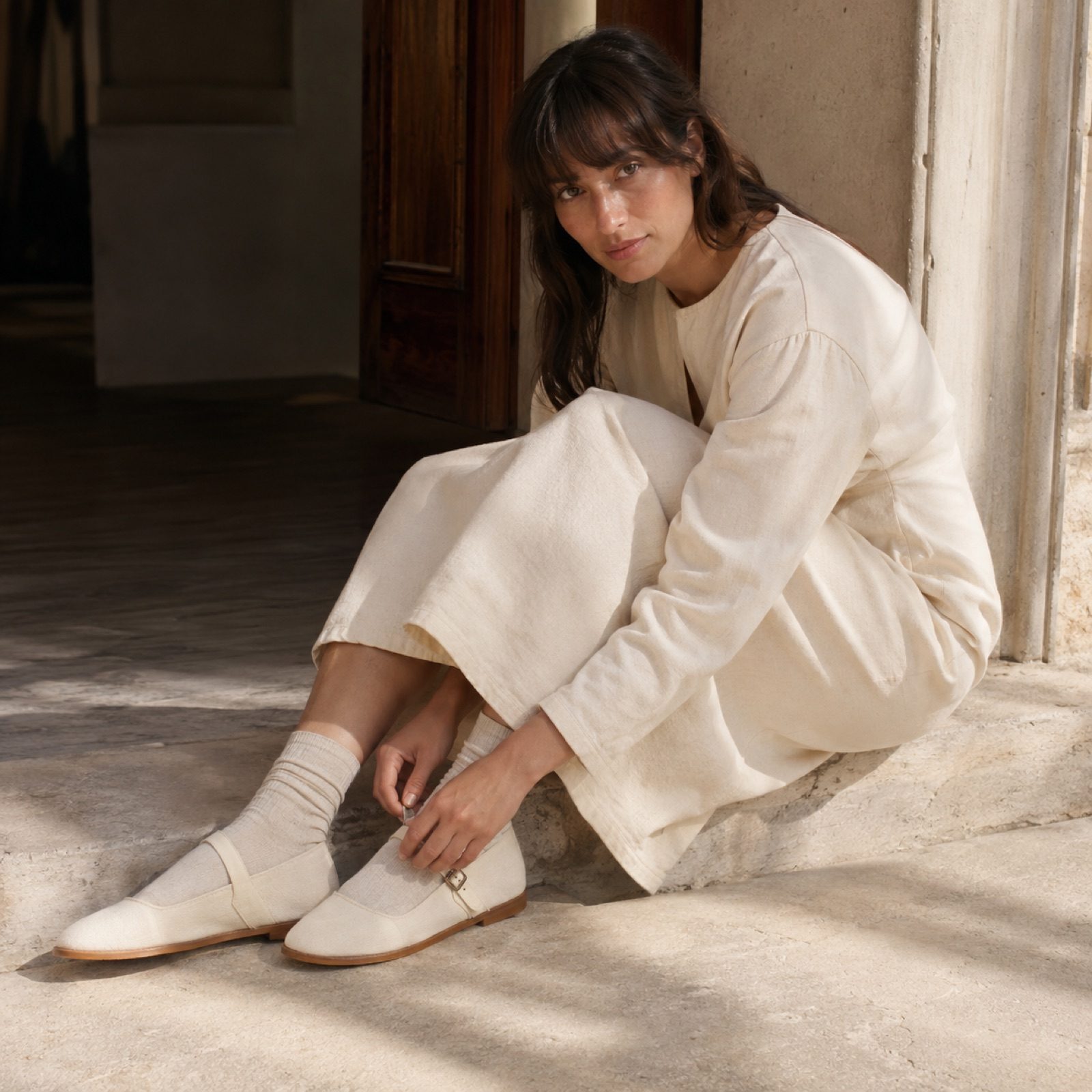 Bramble neutral cream set — Shoe Care by WOODLAND. worn by a model.