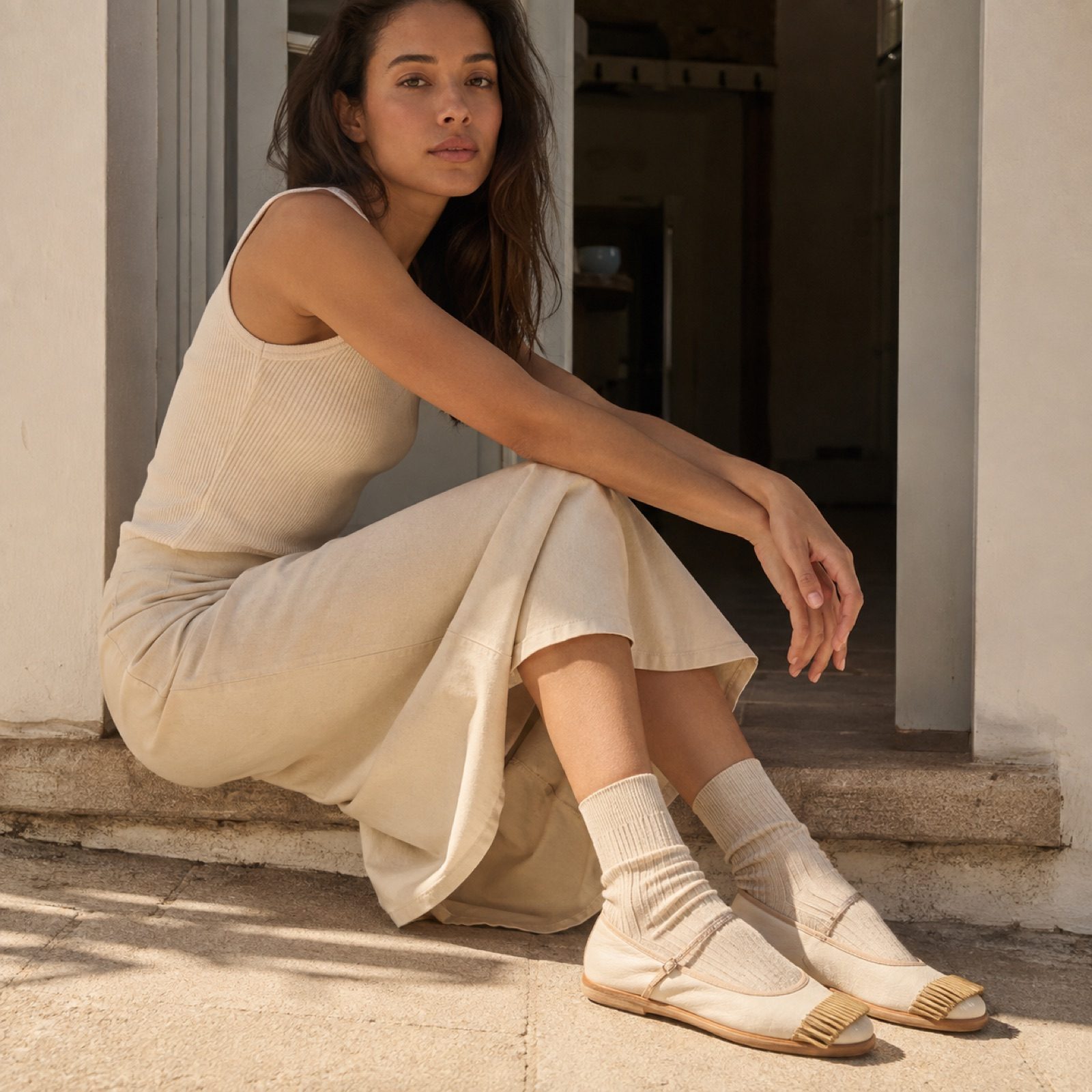 Bramble neutral cream set — Shoe Care by WOODLAND. worn by a model, side view.
