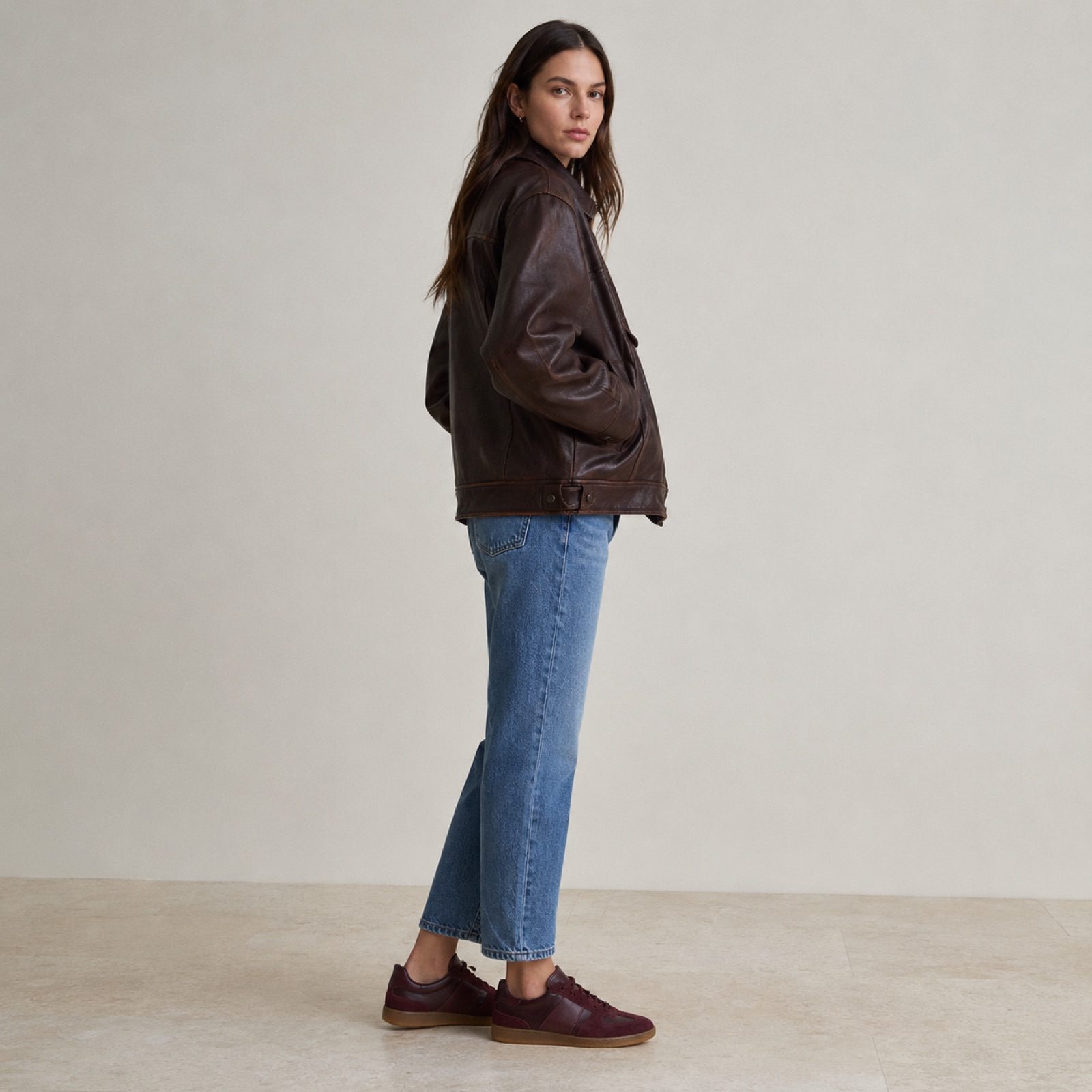 Harbour low gum-sole trainer — Trainers by WOODLAND. worn by a model, side view.